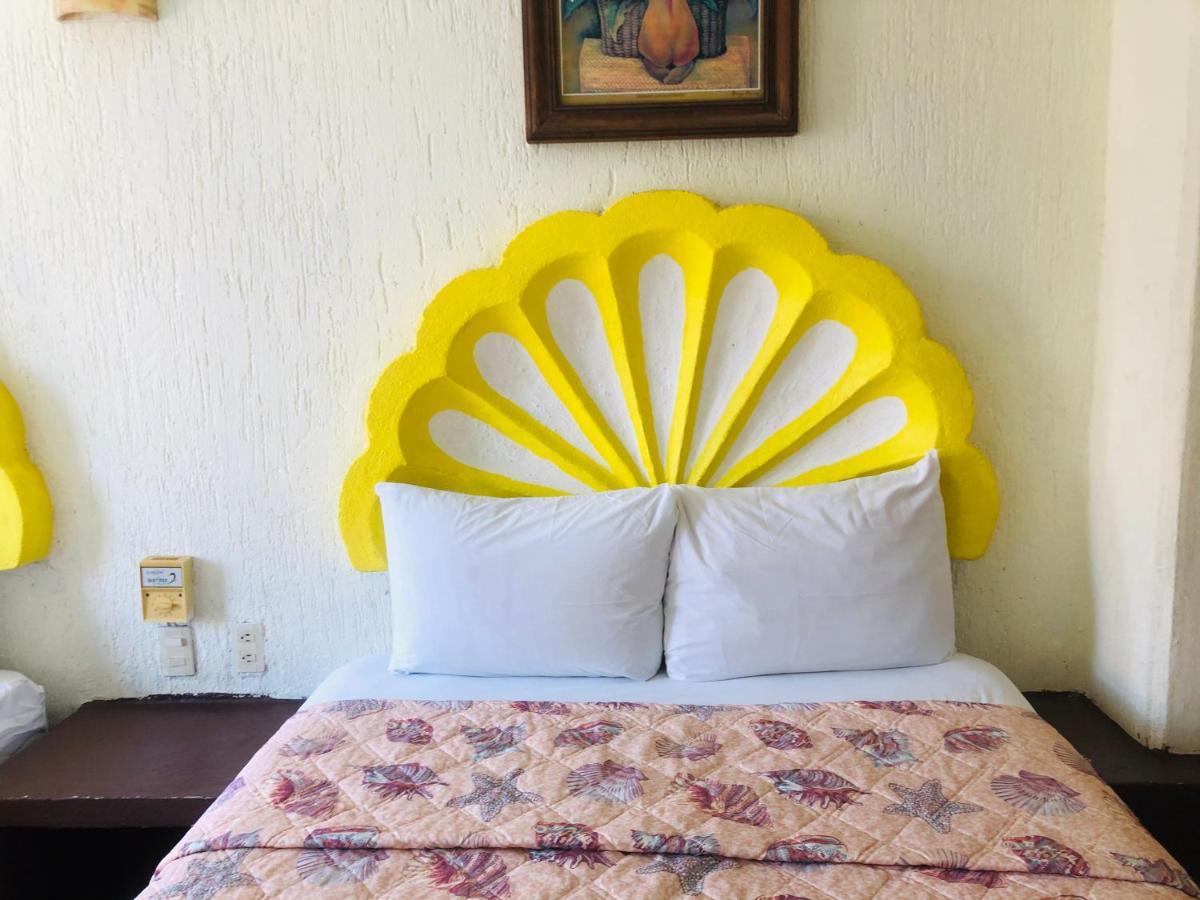 Hotel Playa Santa Cruz by Rotamundos Huatulco Bagian luar foto