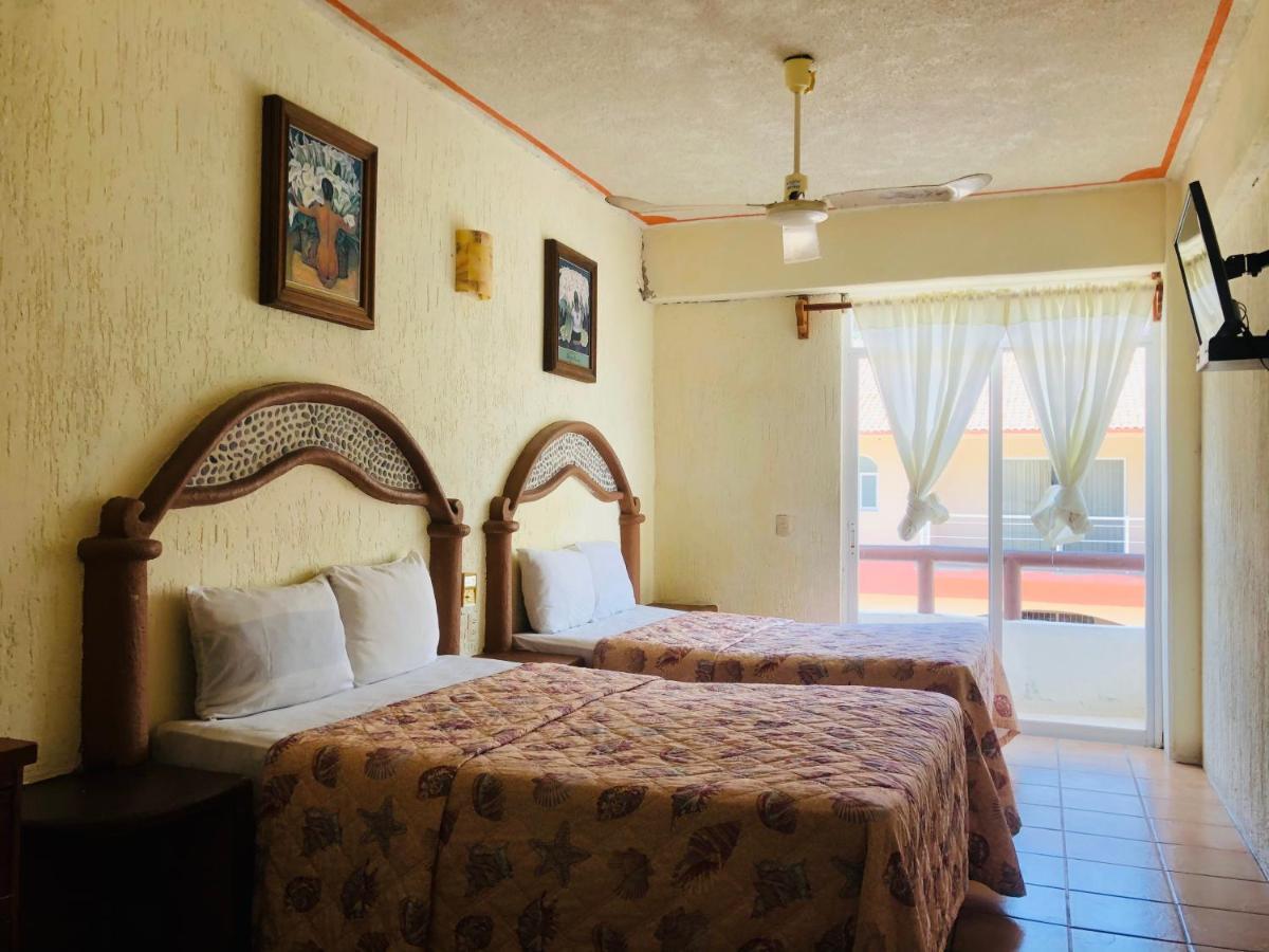 Hotel Playa Santa Cruz by Rotamundos Huatulco Bagian luar foto